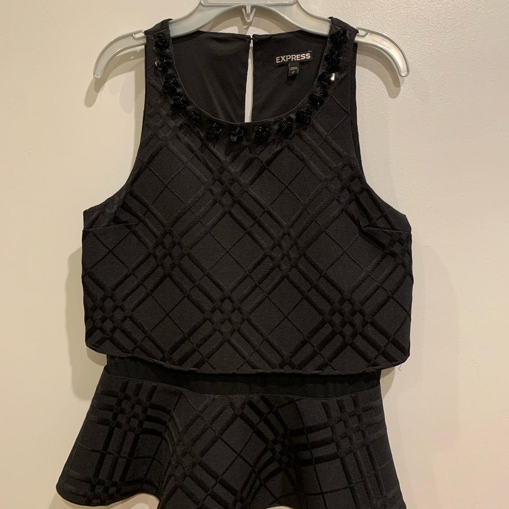 Express peplum top, material is beautiful and beading is pretty.
